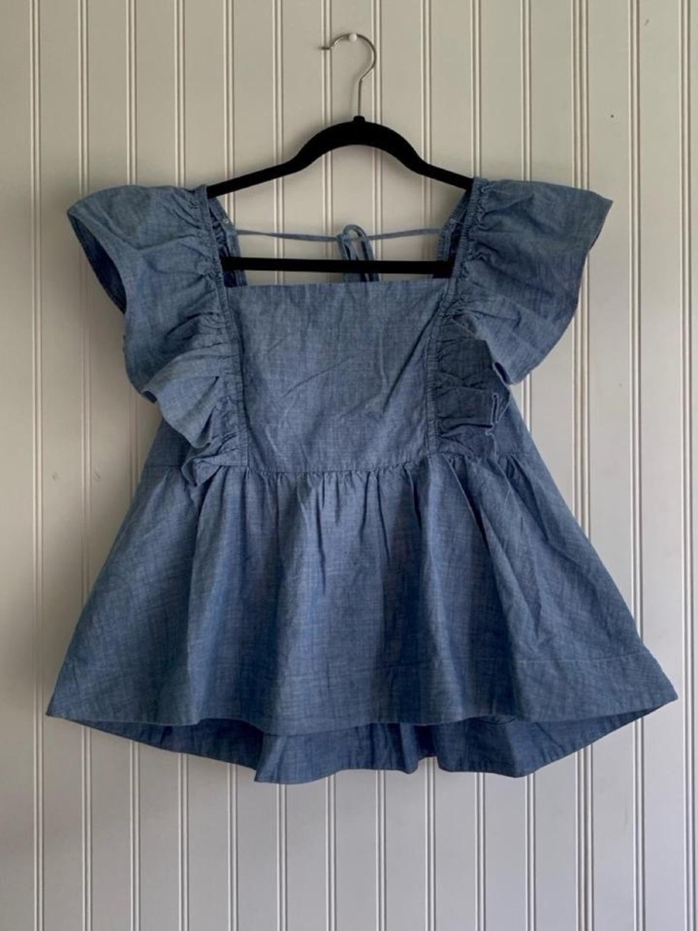 Blue chambray ruffle blouse with tie back cotton peplum top, women’s L 12–14